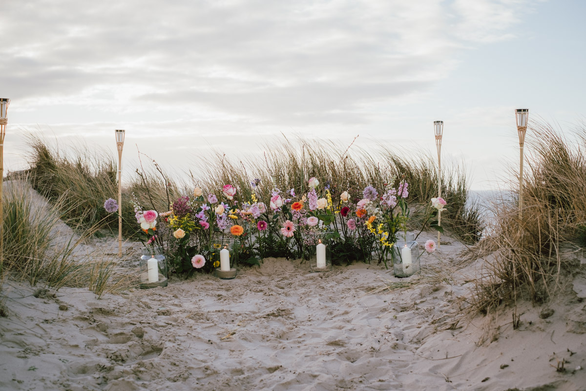 Demande en mariage sur la plage d'Ostende au coucher du soleil